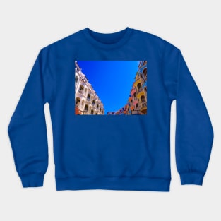 Low angle view of ancient two row of upper floors Crewneck Sweatshirt